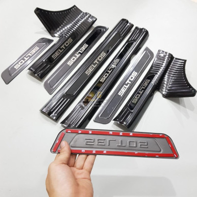 Bộ sản phẩm ỐP BẬC CỐP VÀ BẬC CỬA vân Carbon xe Kia Seltos