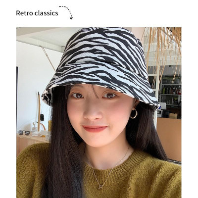 Mũ bucket nam nữ họa tiết trắng đen - Nón Ulzzang vành tròn con bò sữa hottrend 2021