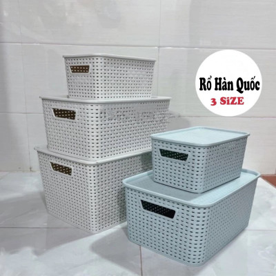  Thùng đựng đồ bằng nhựa giả mây có nắp đậy.