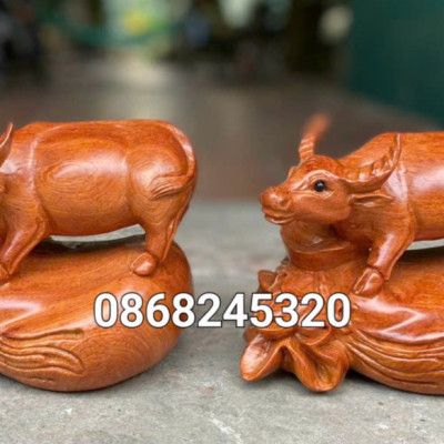 TƯỢNG CON TRÂU PHONG THỦY BẰNG GỖ HƯƠNG ĐÁ KT 20×15×15CM