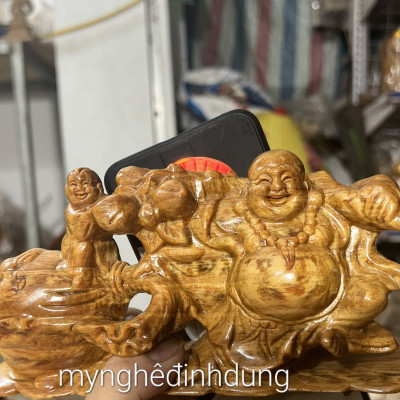 Tượng phật di lặc kéo bao vàng để ôtô bàn học bàn làm việc...bằng gỗ huyết long kt 20×10×7cm 
