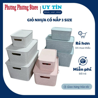  Thùng đựng đồ bằng nhựa giả mây có nắp đậy.