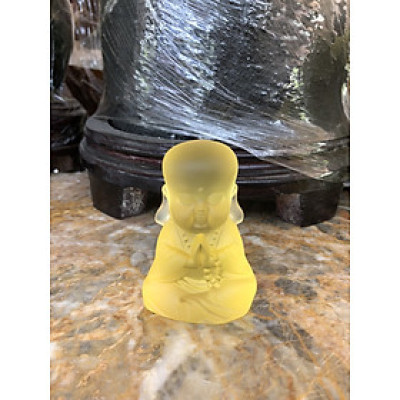 Tượng chú tiểu ngồi đá lưu ly