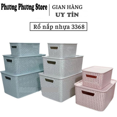  Thùng đựng đồ bằng nhựa giả mây có nắp đậy.