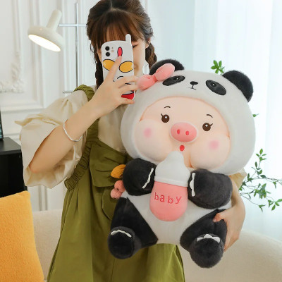 Thú nhồi bông heo cosplay gấu trúc ôm bình sữa - Size từ 25cm đến 85cm - Quà tặng gấu bông heo ôm bình sữa êm mịn cho bé.