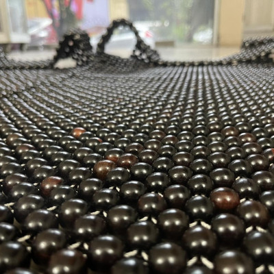 Đệm ghế ô tô hạt gỗ trắc 12 ly Demtrac12